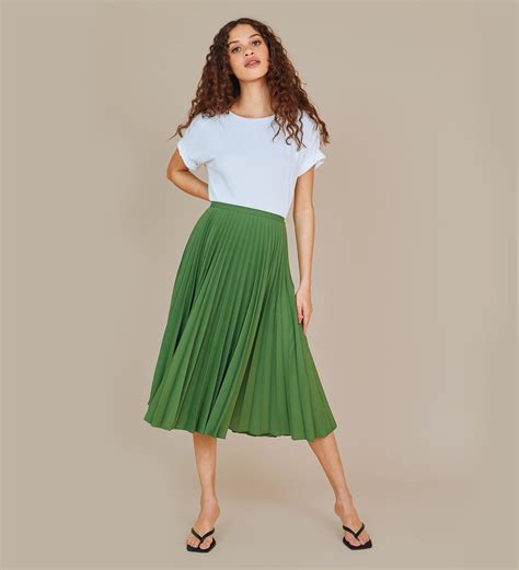 green skirt with white top